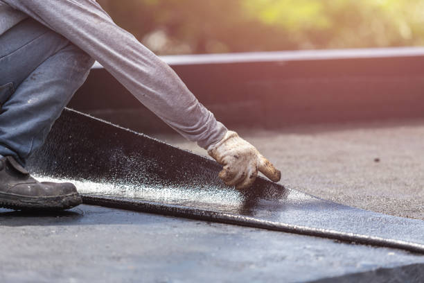 Professional Waterproofing technician working in Urbana, IN